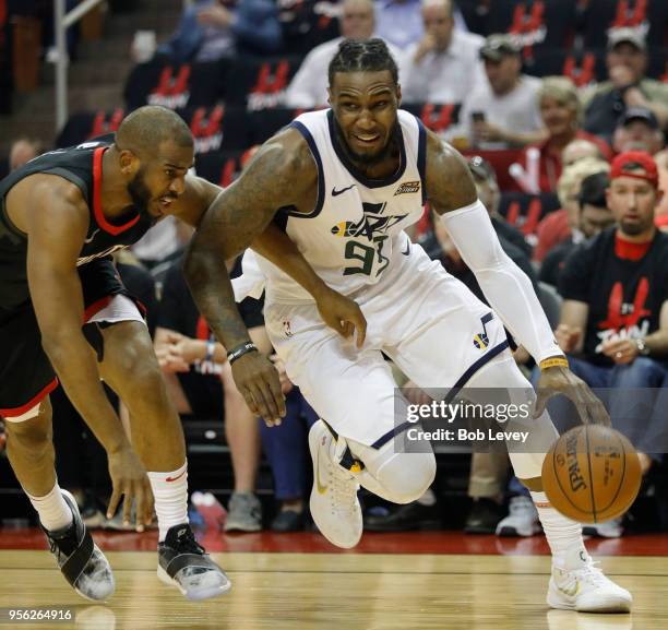 Jae Crowder of the Utah Jazz drives around Chris Paul of the Houston Rockets during Game Five of the Western Conference Semifinals of the 2018 NBA...