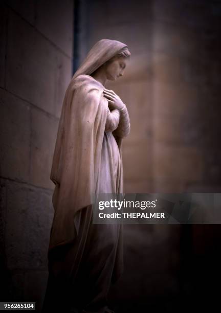 statue of religious woman sacre coeur - catholic saints stock pictures, royalty-free photos & images