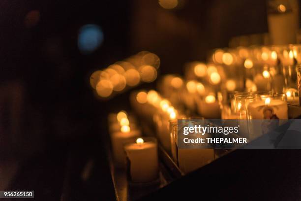 church candles paris - lighting candle stock pictures, royalty-free photos & images