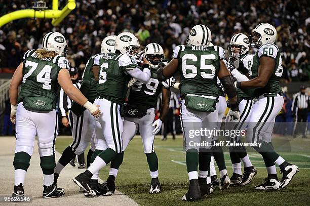 Jerricho Cotchery of the New York Jets celebrates his touchdown with teammates in the second quarter of the game against the Cincinnati Bengals at...