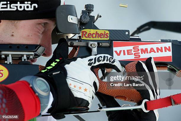 Dominik Landertinger of Austria shoots at the shooting range prior to the Men's 4 x 7,5km Relay in the e.on Ruhrgas IBU Biathlon World Cup on January...