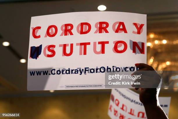 Supporter holds up a campaign sign for Democratic Gubernatorial candidate Richard Cordray and Democratic Lieutenant Gubernatorial Candidate Betty...