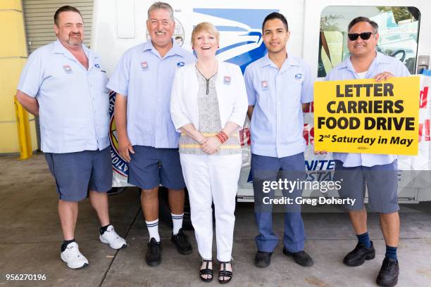 Mail Carriers John Burton and Brian Wilson, Alison Arngrim, Francisco Valenzuela and David Sanagustin attend the Edward James Olmos launches Stamp...