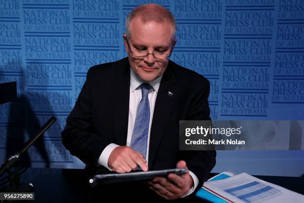 Treasurer Scott Morrison prepares to speak to media representatives about the 2018 Budget Release at Parliament House on May 9, 2018 in Canberra,...