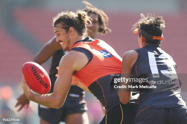 Phil Davis of the Giants in action during a Greater Western Sydney Giants AFL training session at Spotless Stadium on May 9, 2018 in Sydney,...