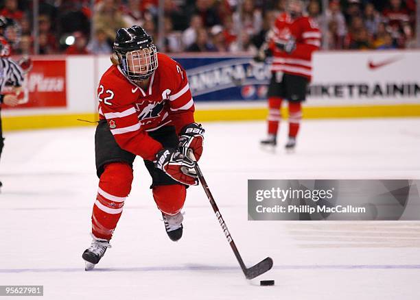 Hayley Wickenheiser of Team Canada skates with the puck during the game against Team USA at Scotiabank Place on January 1, 2010 in Ottawa, Canada.