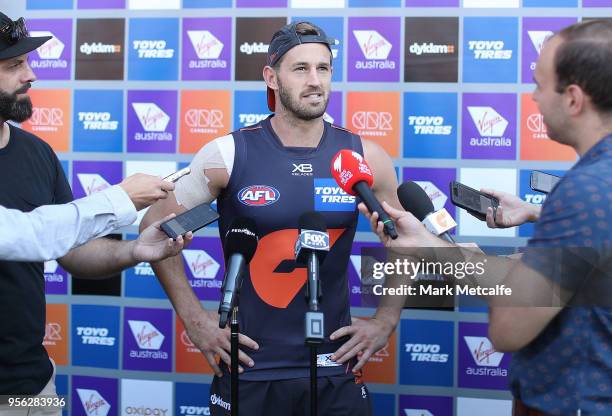 Callan Ward of the Giants speaks to media during a Greater Western Sydney Giants AFL training session at Spotless Stadium on May 9, 2018 in Sydney,...