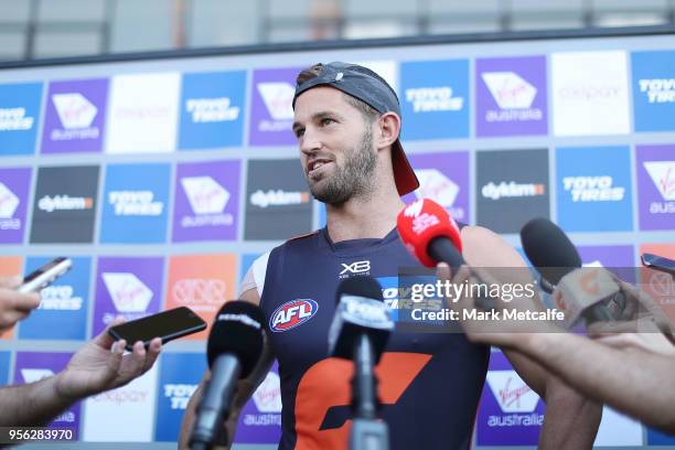 Callan Ward of the Giants speaks to media during a Greater Western Sydney Giants AFL training session at Spotless Stadium on May 9, 2018 in Sydney,...