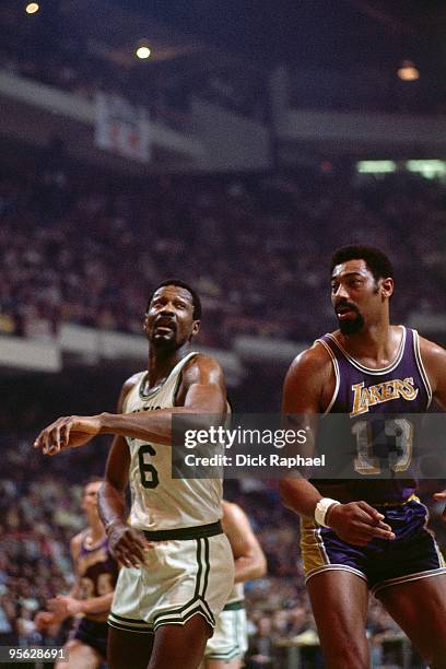 Bill Russell of the Boston Celtics stands against Wilt Chamberlain of the Los Angeles Lakers during a game played in 1968 at the Boston Garden in...