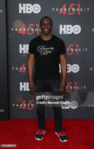 Actor Gbenga Akinnagbe poses for a picture on the red carpet during the "Fahrenheit 451" New York premiere at NYU Skirball Center on May 8, 2018 in...