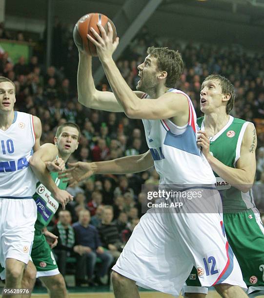 Zalgiris Kauna's Dainius Salenga vies with Cibona Zagreb Luksa Andric during their Euroleague basketball Championship match in Kaunas, on January 7,...