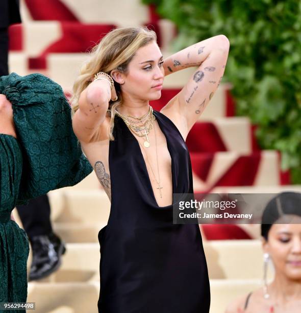 Miley Cyrus attends the Heavenly Bodies: Fashion & The Catholic Imagination Costume Institute Gala at The Metropolitan Museum of Art on May 7, 2018...