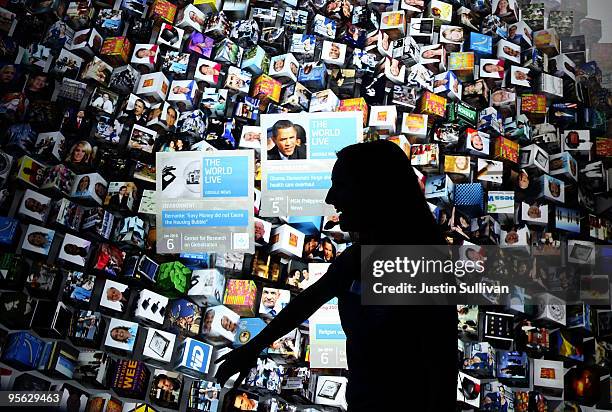 An Intel employee demonstrates the Intel Infoscape interactive touchscreen display at the 2010 International Consumer Electronics Show at the Las...