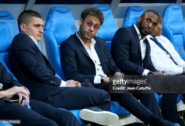 Marco Verratti, Neymar Jr, Kevin Rimane of PSG seating on the bench before the French Cup final between Les Herbiers VF and Paris Saint-Germain at...