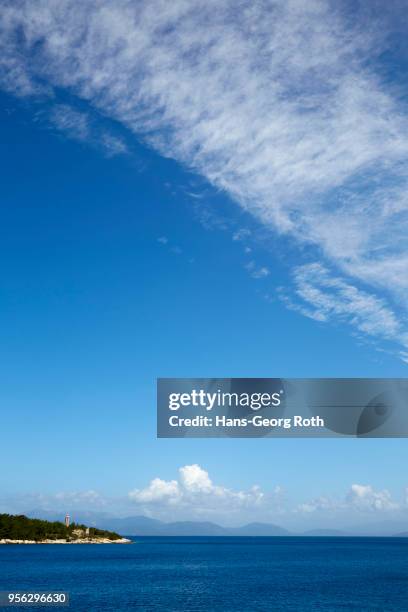 view of the cape with lighthouse - fiskardo stockfoto's en -beelden