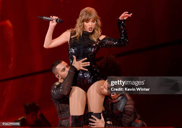 Taylor Swift performs onstage during opening night of her 2018 Reputation Stadium Tour at University of Phoenix Stadium on May 8, 2018 in Glendale,...