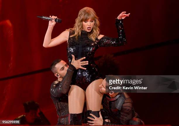 Taylor Swift performs onstage during opening night of her 2018 Reputation Stadium Tour at University of Phoenix Stadium on May 8, 2018 in Glendale,...