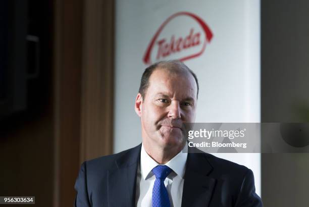 Christophe Weber, president and chief executive officer of Takeda Pharmaceutical Co., walks to the podium during a news conference in Tokyo, Japan,...