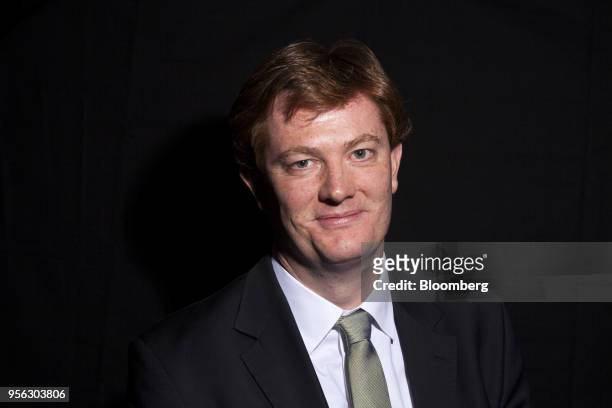 Danny Alexander, vice president at the Asian Infrastructure Investment Bank , poses for a photograph on the sidelines of the JP Morgan Global China...