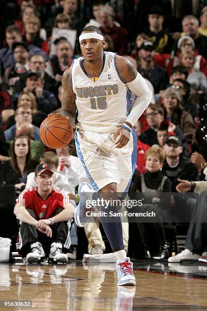 Carmelo Anthony of the Denver Nuggets drives the ball up court during the game against the Portland Trail Blazers on December 25, 2009 at the Rose...