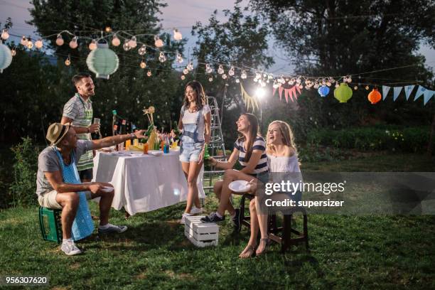 outdoor party - evening meal stock pictures, royalty-free photos & images