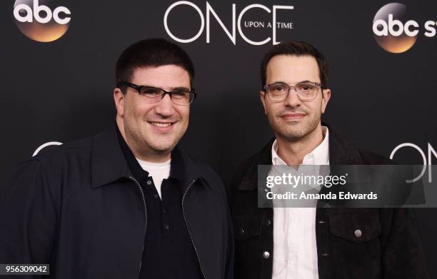 Creators and executive producers Adam Horowitz and Edward Kitsis arrive at the "Once Upon A Time" finale screening at The London West Hollywood at...