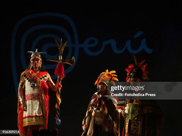 Inca costumed actors, with the Peruvian trade mark in the background, performing the sun fest ceremony at the launching of the Inti Raymi Fest at the...