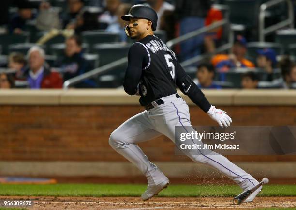 Carlos Gonzalez of the Colorado Rockies in action against the New York Mets at Citi Field on May 5, 2018 in the Flushing neighborhood of the Queens...