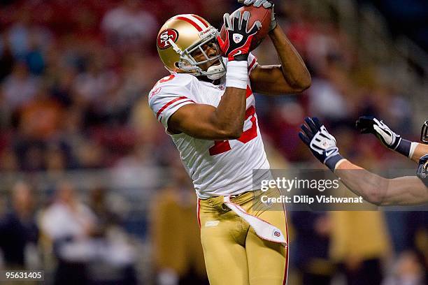 Michael Crabtree of the San Francisco 49ers makes a catch during the game against the St. Louis Rams at the Edward Jones Dome on January 3, 2010 in...