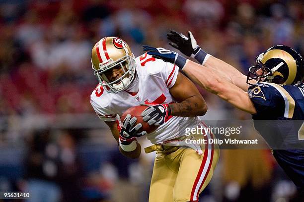 Michael Crabtree of the San Francisco 49ers makes a catch during the game against the St. Louis Rams at the Edward Jones Dome on January 3, 2010 in...