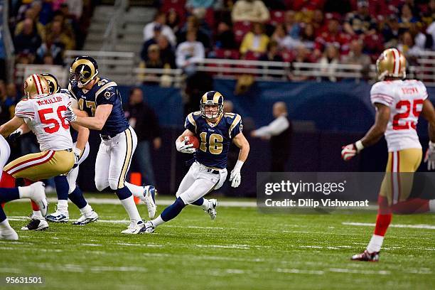 Danny Amendola of the St. Louis Rams carries the ball during the game against the San Francisco 49ers at the Edward Jones Dome on January 3, 2010 in...