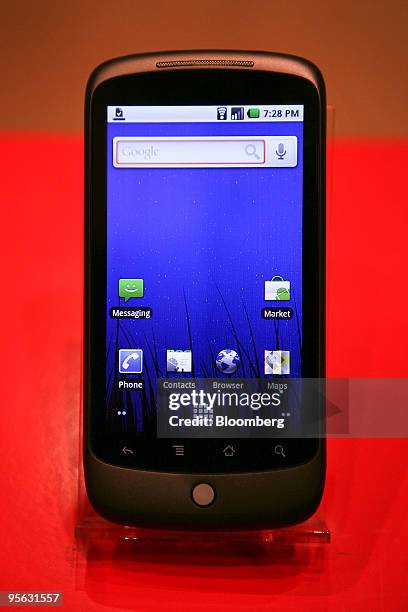 Google Inc.'s Nexus One phone sits on display during the Digital Experience event at the 2010 International Consumer Electronics Show in Las Vegas,...