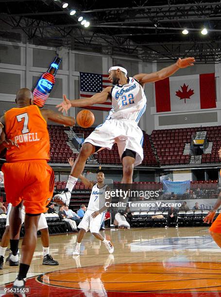 Mustafa Shakur of the Tulsa 66ers passes to teammate Zabian Dowdell of the Tulsa 66ers against the Albuquerque Thunderbirds during the 2010 D-League...