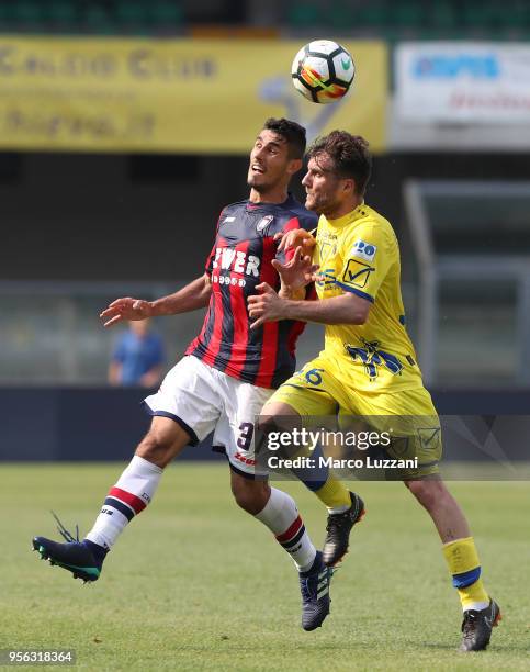 Davide Faraoni of FC Crotone competes for the ball with Perparim Hetemaj of AC Chievo Verona during the serie A match between AC Chievo Verona and FC...