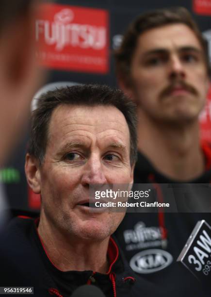Bombers coach John Worsfold speaks to the media during an Essendon Bombers AFL training session at the Hangar on May 9, 2018 in Melbourne, Australia.
