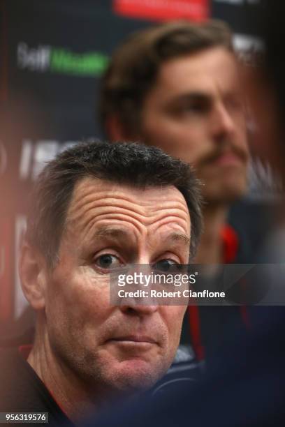 Bombers coach John Worsfold speaks to the media during an Essendon Bombers AFL training session at the Hangar on May 9, 2018 in Melbourne, Australia.