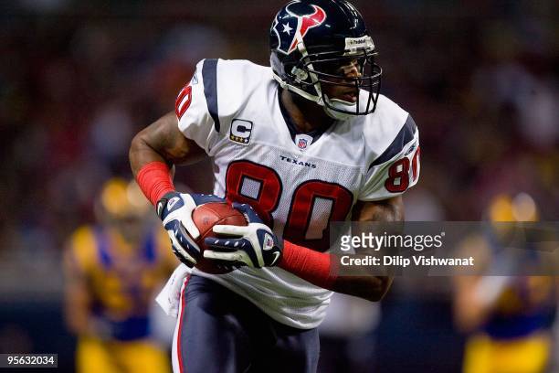 Andre Johnson of the Houston Texans carries the ball during the game against the St. Louis Rams at Edward Jones Dome on December 20, 2009 in St....