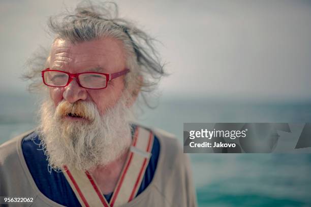 old fisherman by the sea - blue eyed soul stock pictures, royalty-free photos & images