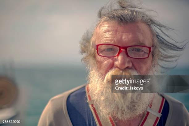 old fisherman by the sea - blue eyed soul stock pictures, royalty-free photos & images