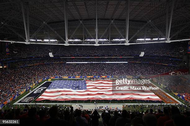 General view of the American flag on the field during the national anthem before the Tostitos Fiesta Bowl between the Boise State Broncos and the TCU...