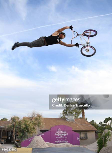 Professional BMX rider Ricardo Laguna performs a Superman Seat Grab on the box jump at RL's Backyard on May 8, 2018 in Las Vegas, Nevada.