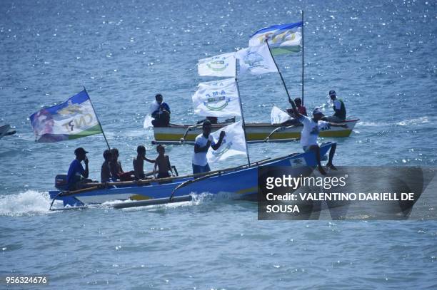 This picture taken in Dili on May 8, 2018 shows supporters of the AMP party attending a last day campaign in Dili. - East Timor is set to hold...
