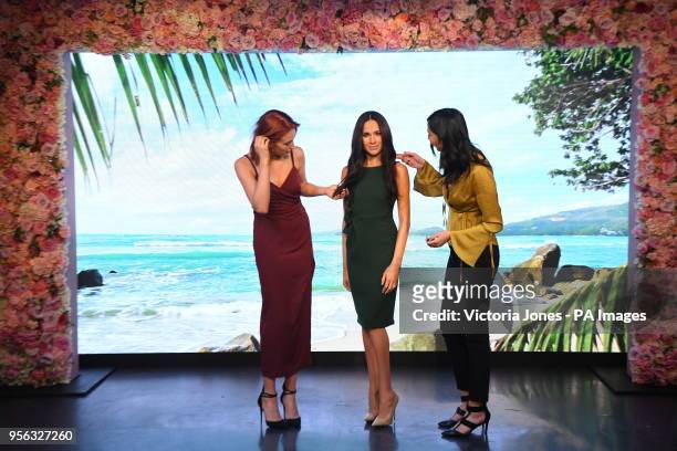 Meghan Markle's wax figure is admired after being unveiled at Madame Tussauds in central London.