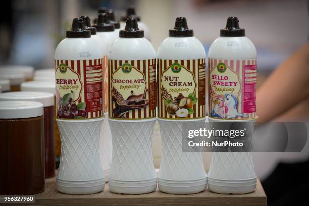 Sweet toppings are seen in squeezable bottles Gluten free pastas are seen at the POLAGRA international trade fair for food in Poznan, Poland on May...
