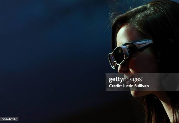 Model wears 3-D glasses at the Panasonic booth during the 2010 International Consumer Electronics Show at the Las Vegas Hilton January 7, 2010 in Las...