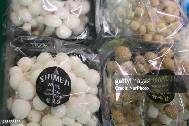 Mushrooms and snacks are seen at a Korean food manufacturers stand at the POLAGRA international trade fair for food in Poznan, Poland on May 8, 2018....