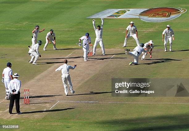 Graeme Smith and Paul Harris of South Africa collide going for a catch during day 5 of the 3rd test match between South Africa and England from...