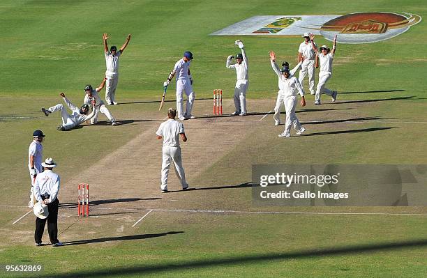 Hashim Amla and AB de Villiers of South Africa claim a catch during day 5 of the 3rd test match between South Africa and England from Newlands...