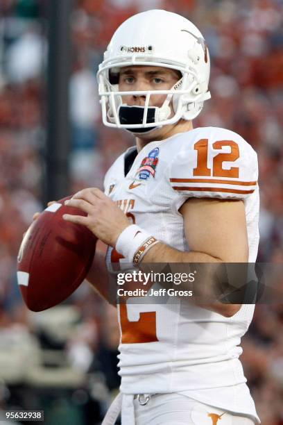 Quarterback Colt McCoy of the Texas Longhorns looks on before taking on the Alabama Crimson Tide in the Citi BCS National Championship game at the...