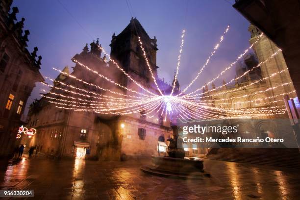cathedral in rainy night in santiago de compostela. - christmas town stock pictures, royalty-free photos & images